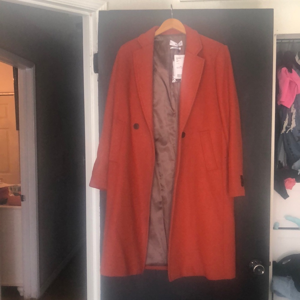 It’s a mango coat reddish orange